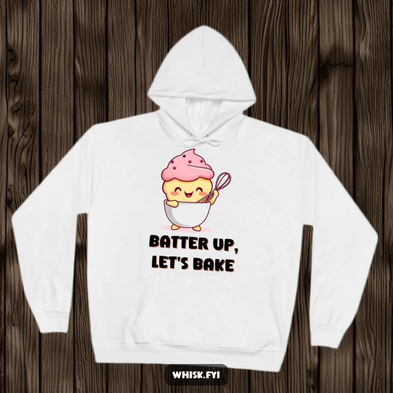 Funny Kawaii muffin character energetically whisking a bowl, featured on a soft and cozy hoodie.