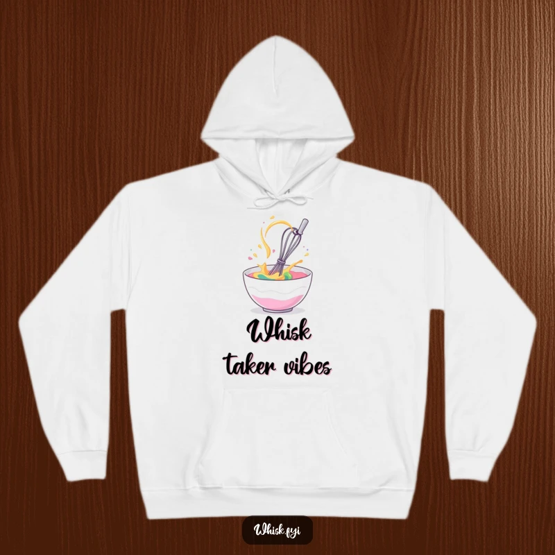 Funny hoodie showing a giggling whisk in wild motion within a bowl of batter, ideal for cozy humor.