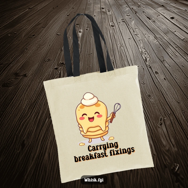 Funny tote bag with a cheerful pancake character flipping batter with a whisk, a charming and humorous accessory for breakfast lovers.