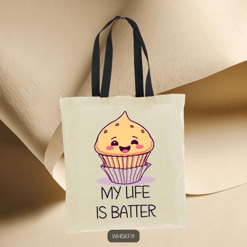 Funny tote bag depicting a joyful muffin character popping its head out of its liner with contagious glee.